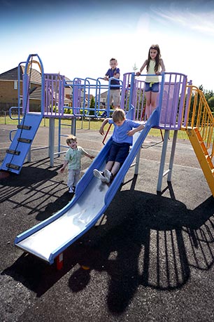 Children playing on playpark apparatus